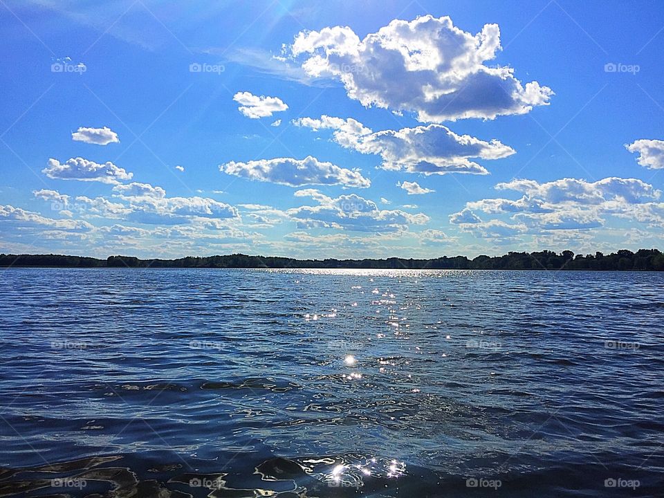 Sparkling Sun reflection on the lake 