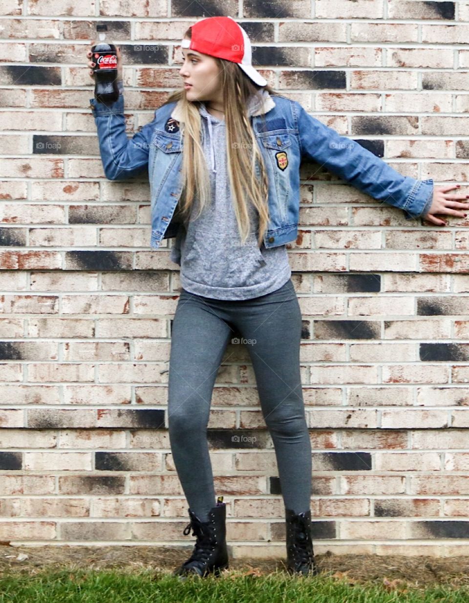 Coca’Cola-girl on wall with a coke.