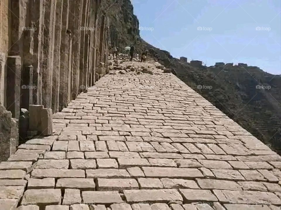 A stunning view of green mountains covered in fog in Yemen