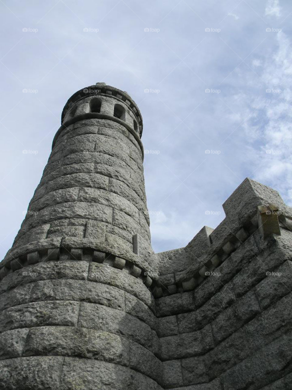 Up shot of a castle like tower in fort Washington. 