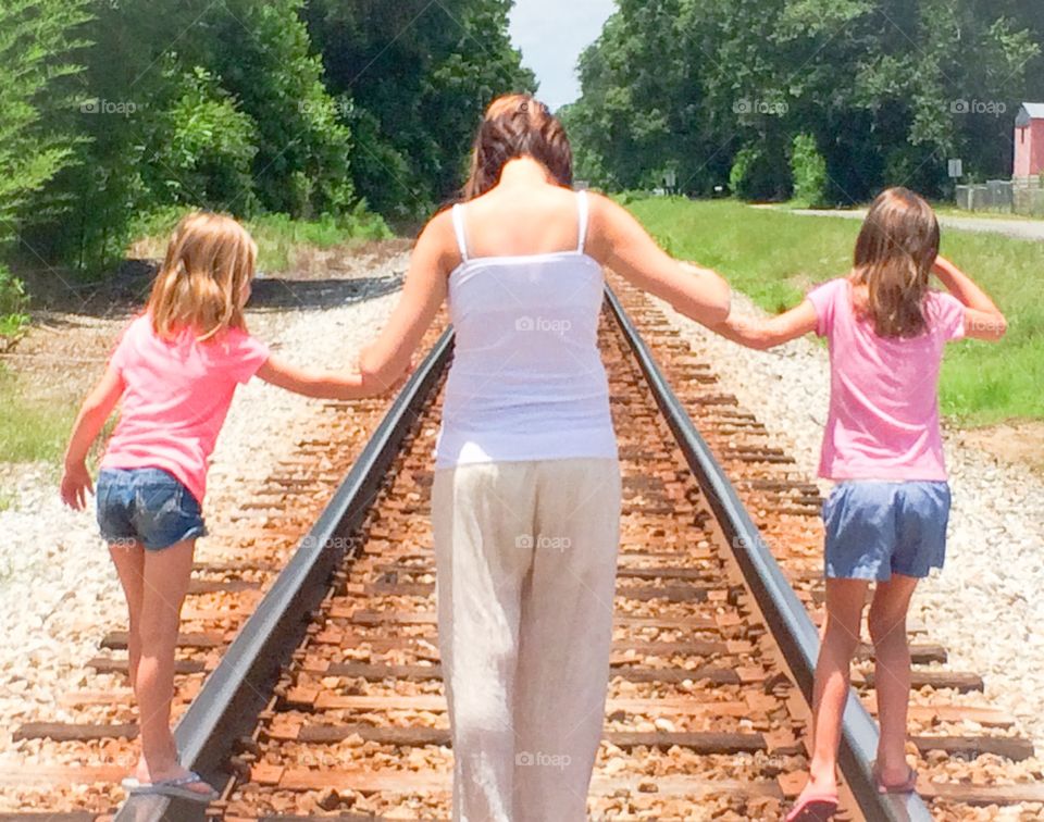 Walking on the railroad tracks 