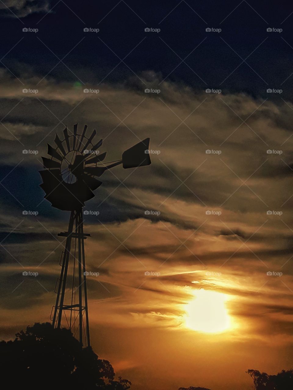 sunset and a windmill