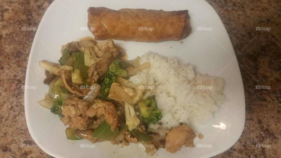 chicken stir-fry with white rice and egg roll