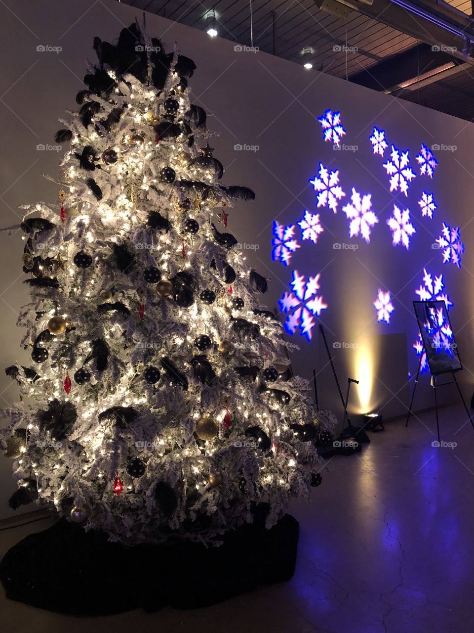 Flocked Christmas tree and snowflake lights