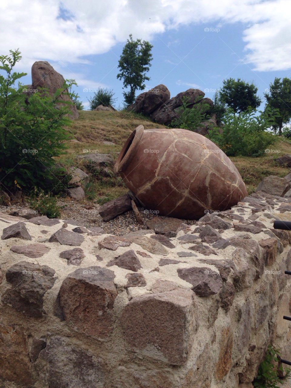 Clay jar and artifacts in Peristera fortress  in Bulgaria - Ancient and Medieval archaeological monument in Peshtera, Bulgaria.