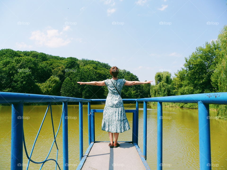 girl on the nature near the lake