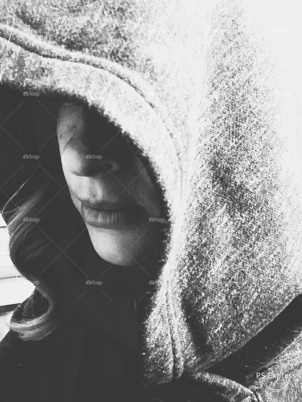 Dark hooded cozy black and white hoodie face
