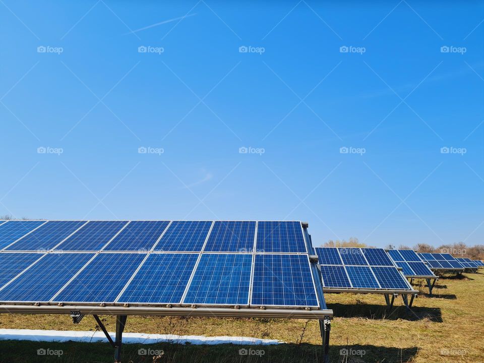 solar panels lined up one behind the other