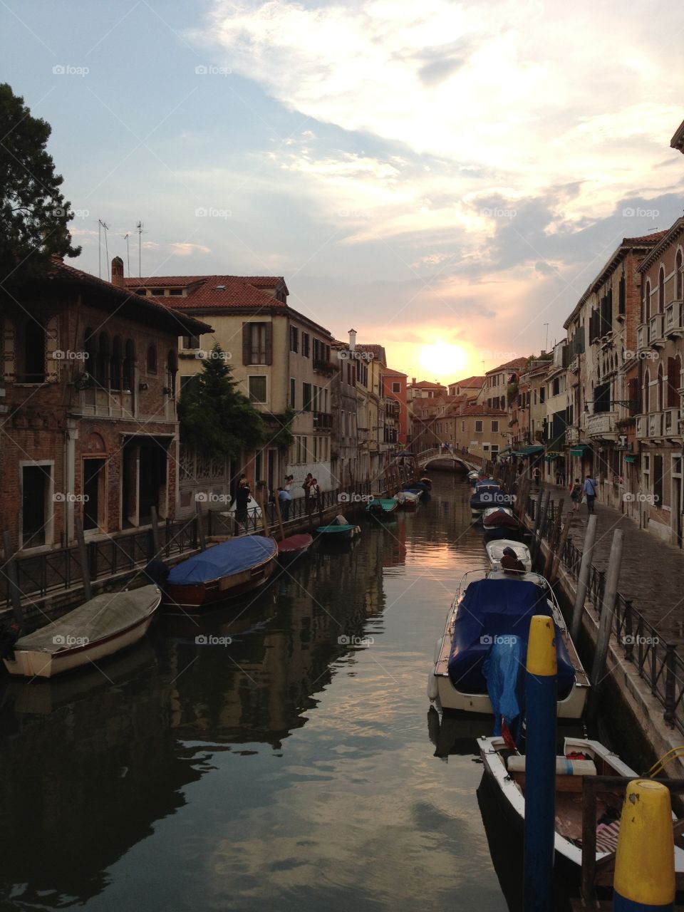 One of the many canals of Venice, Italy at sunset