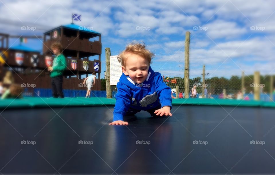 Wee dude. Fun on trampolines 