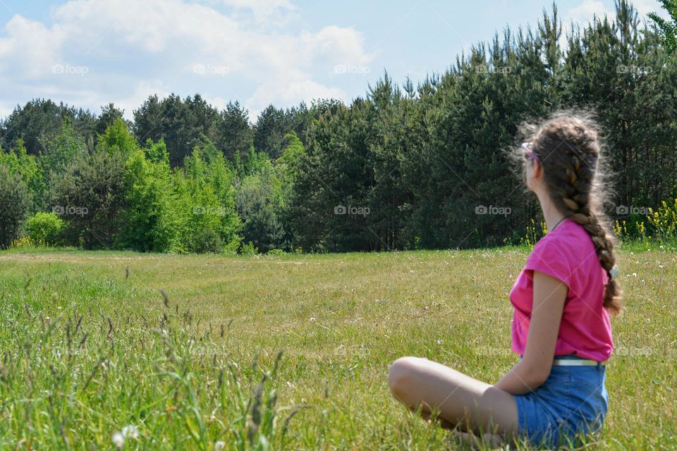 girl relaxing and meditation outside