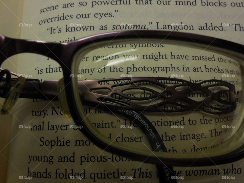 Glasses on book photograph