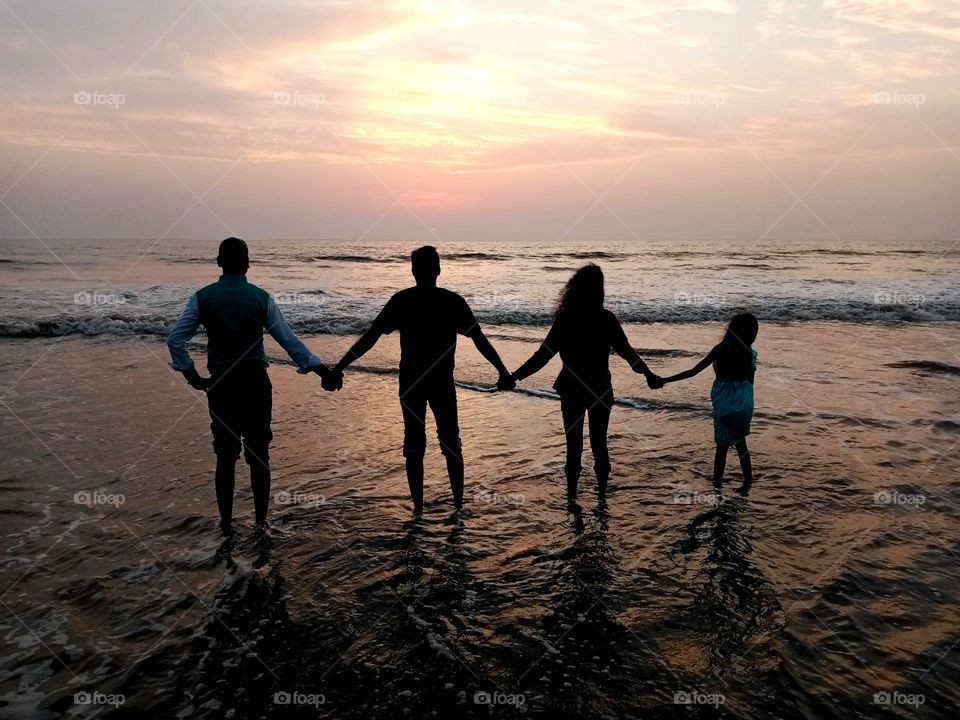 so nice evaning on seashore so beautiful evaning image so cool sea waves all like seashore waves standing in seashore water