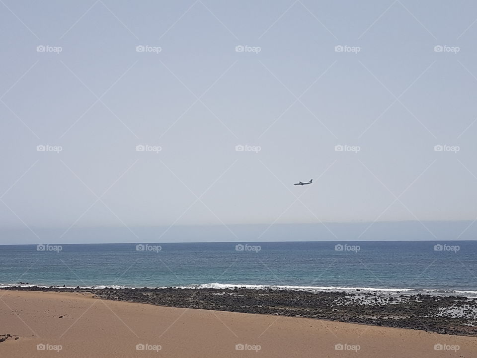 plane over the ocean