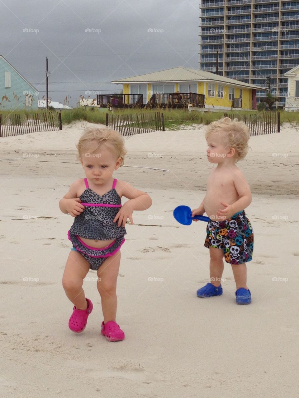 Cute brother and sister at beach
