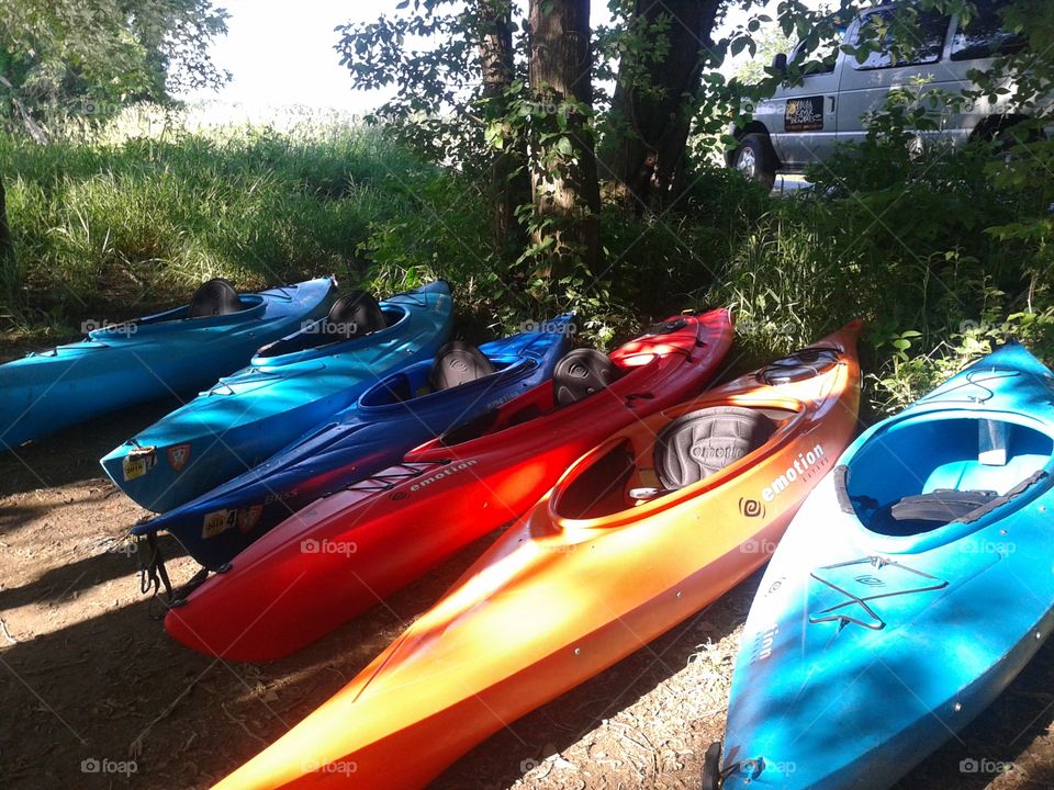 Kayaks. Heading out with a group to enjoy the weather and scenery.