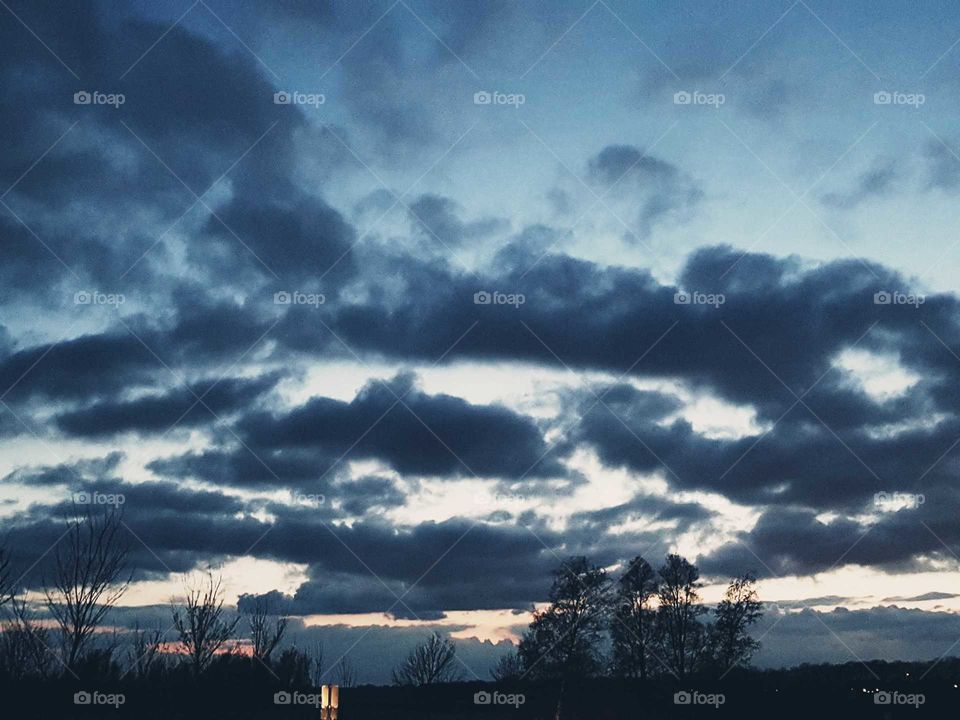 Huge clouds Hanging in the sky.