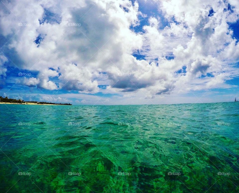 Seaside portrait, swimming in the ocean, the waters of St. Maarten, where the sky meets the water, the calm of the ocean, surfing in the ocean, snorkeling in the ocean, clouds and waves 