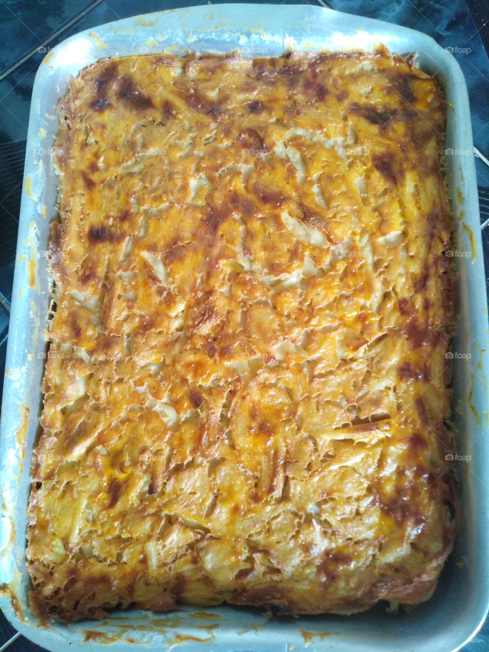 tray Macaroni consists of two layers of macaroni stuffed beef stuffed with a layer of egg and this image after entering the oven