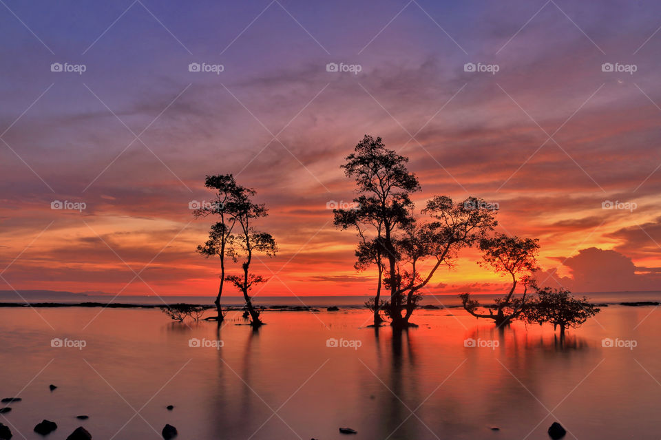 Sunset at Carita beach, Banten, Indonesia.