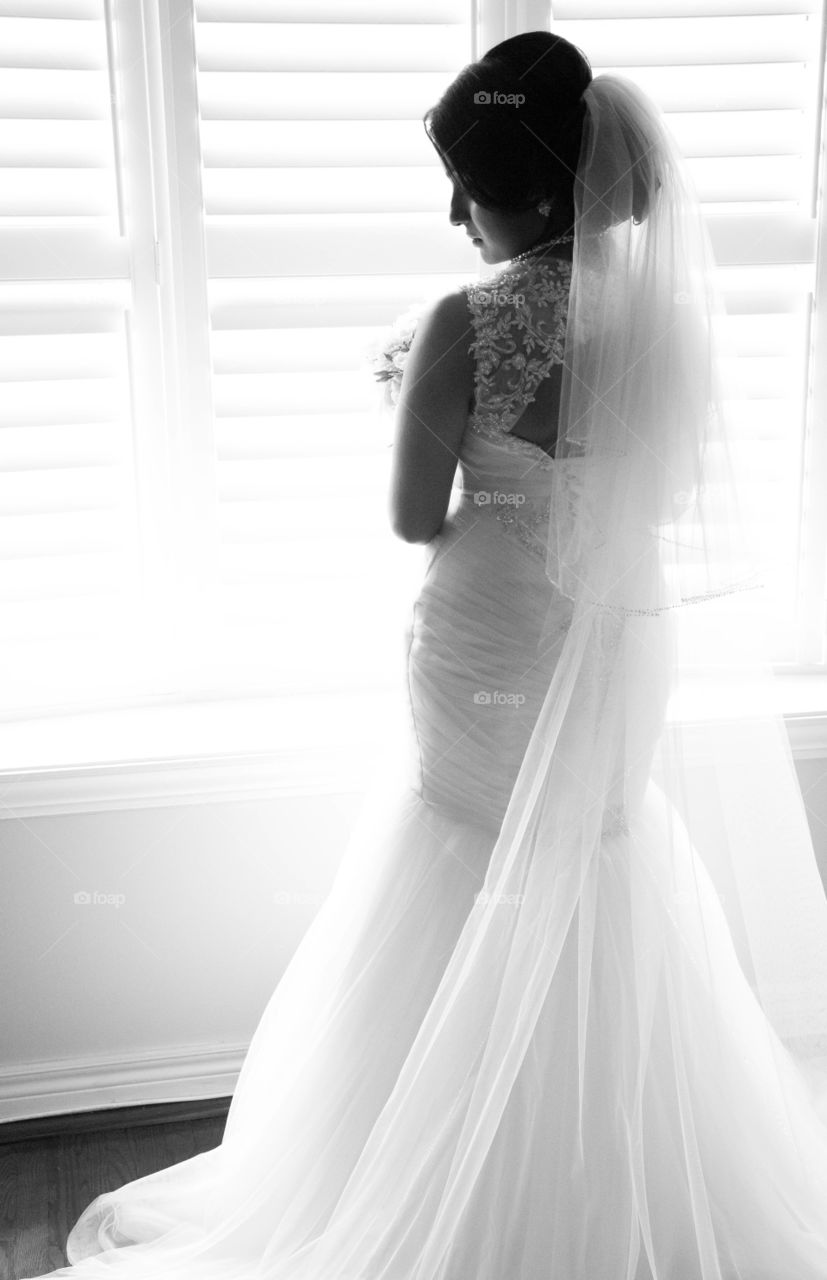 showing off. Taken in Toronto, wedding day dress shot