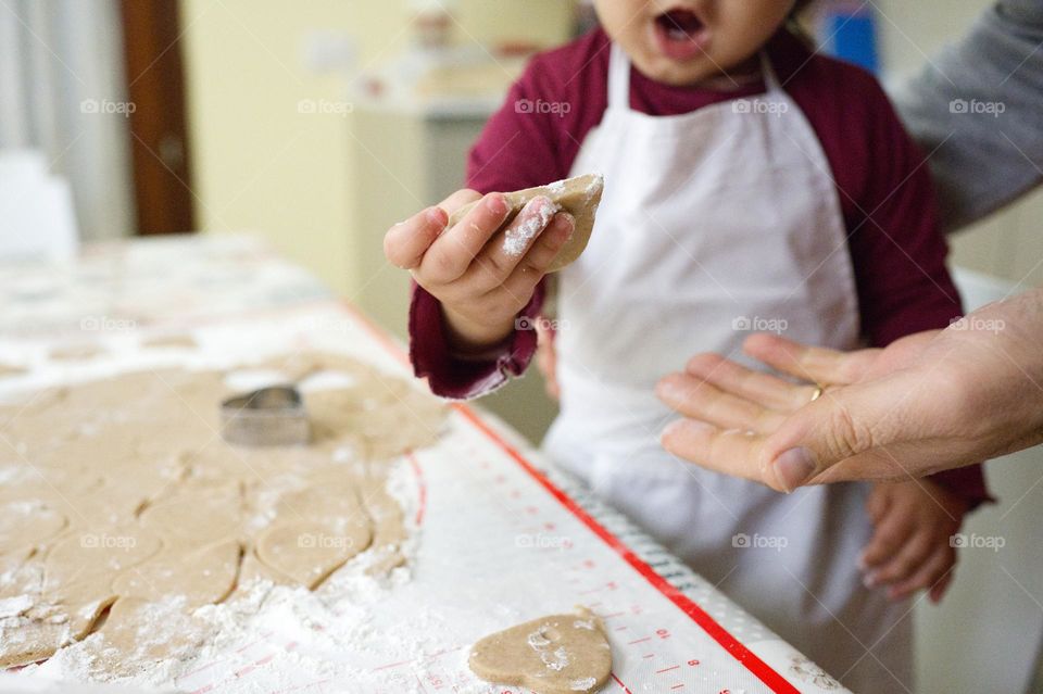 making biscuits with my daughter in a winter day