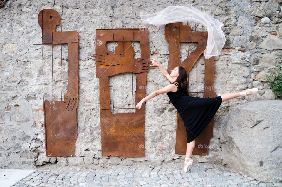 Young Female Ballerina Dancing with a Scarf Outside