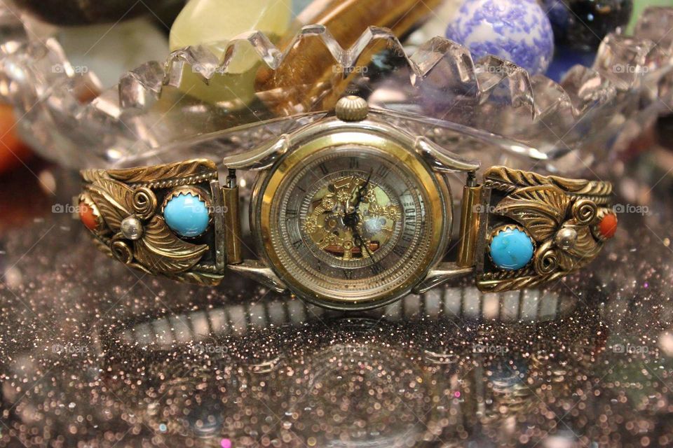 Vintage woman's wrist watch. Reflections, turquoise, silver, coral.