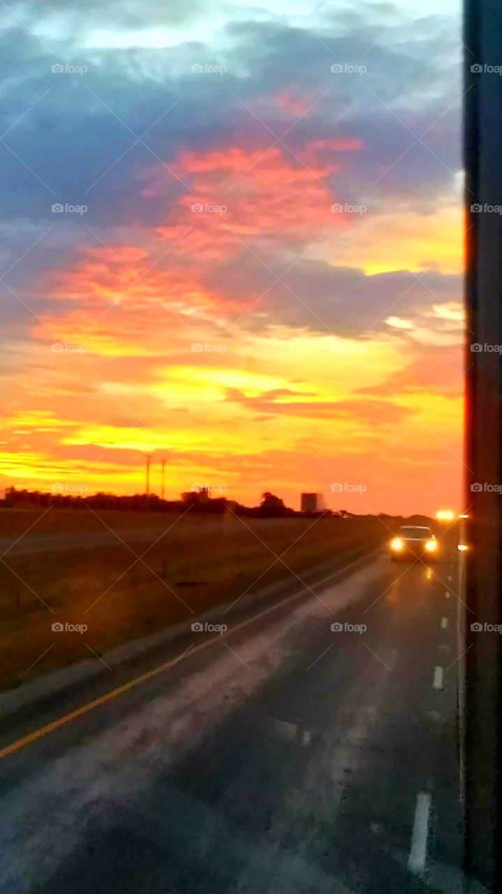Texas sunset in the rearview mirror