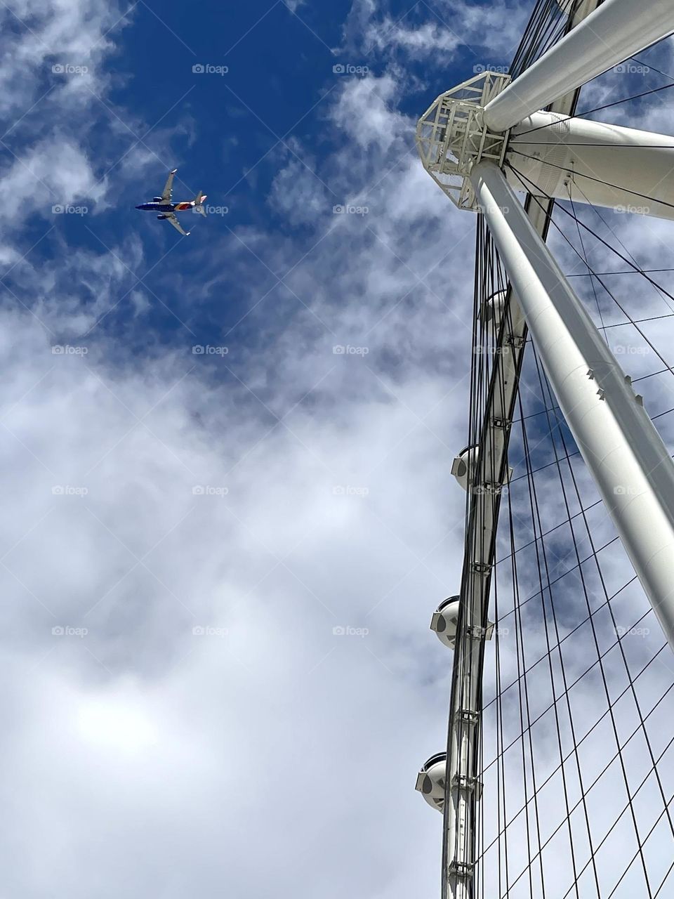 Bottom view to the ferry wheel and airplane 