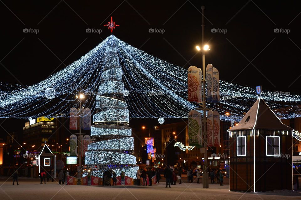 Christmas and New year holiday Christmas tree lights beautiful  night city