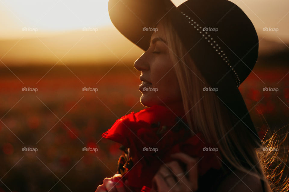 Girl and poppies 