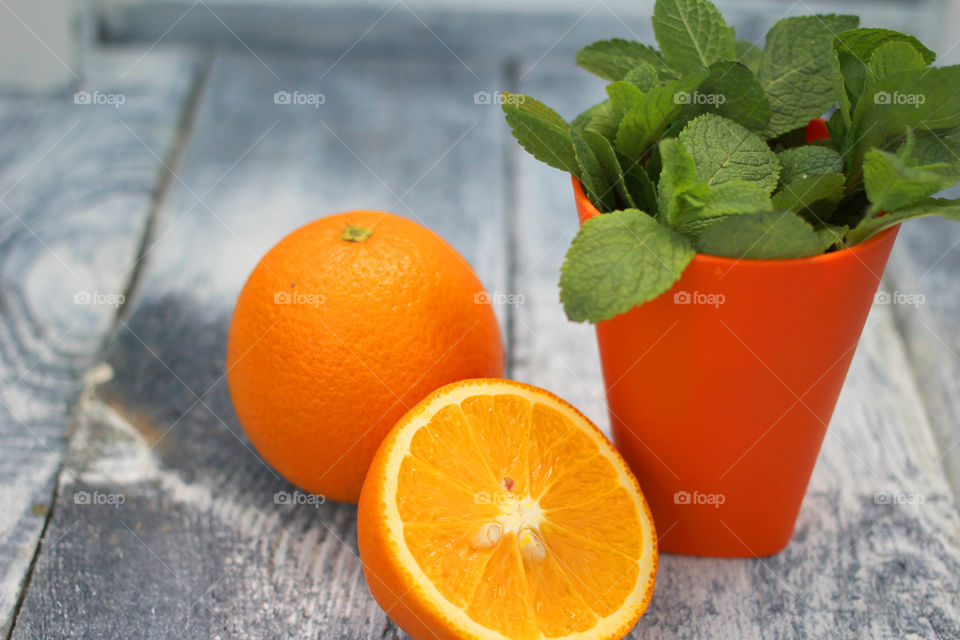 Orange fruit on wooden table