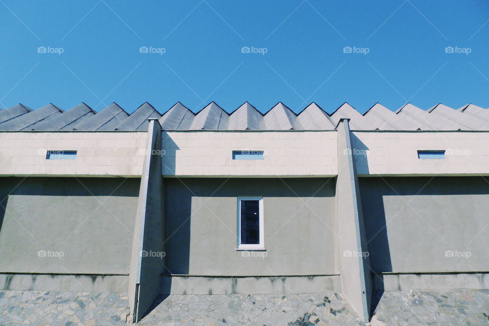 roof of a building against a blue sky