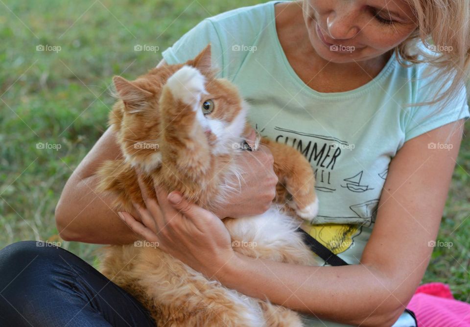 woman and cat pet happy