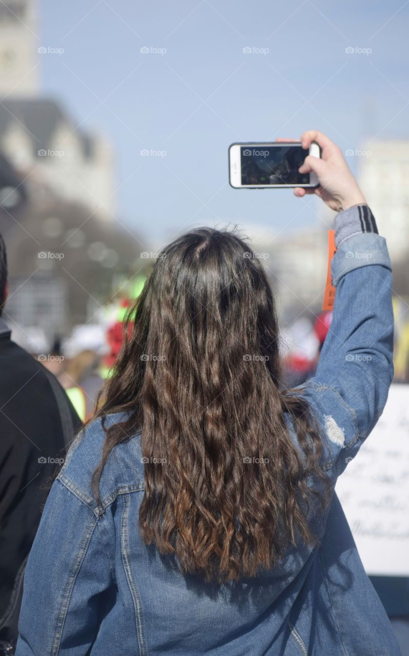 Girl Snapping a Picture