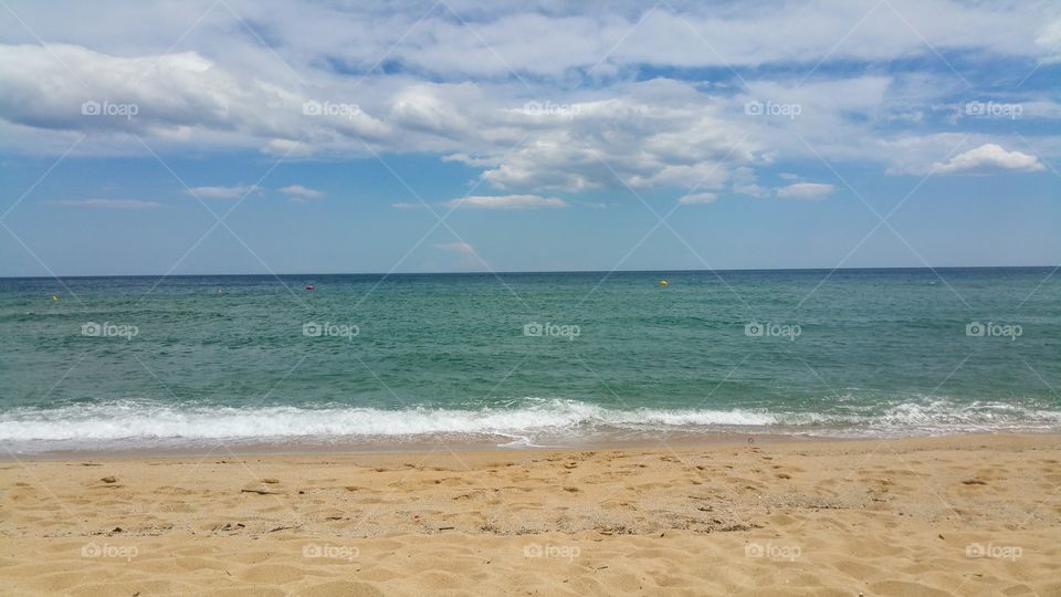 Sky, sea, sand, and sun.