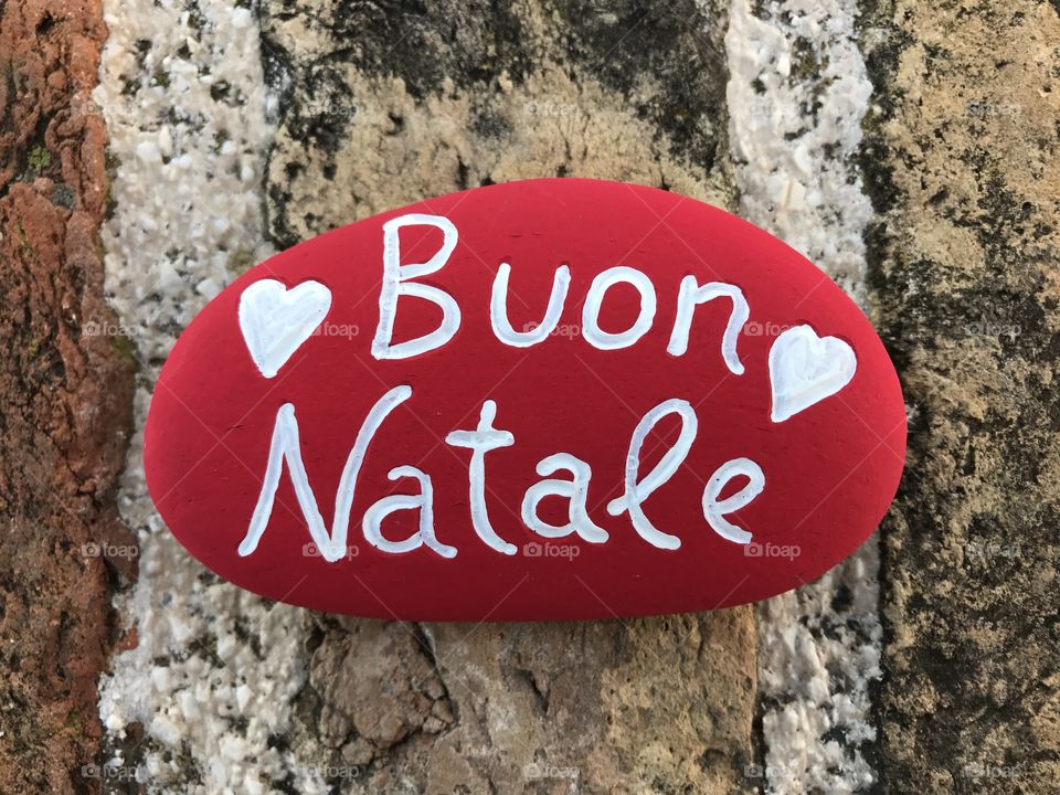 Buon Natale, italian Merry Christmas on a stone