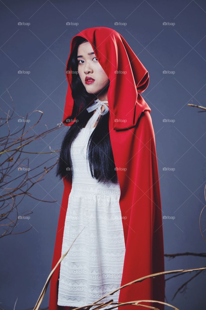 Girl in the little red riding hood costume 