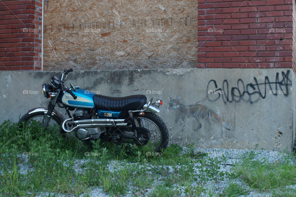 Vintage bike and street art. Cool old bike in ally