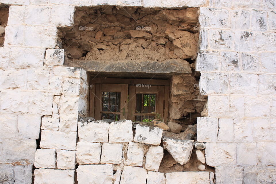 broken windows of abandoned house