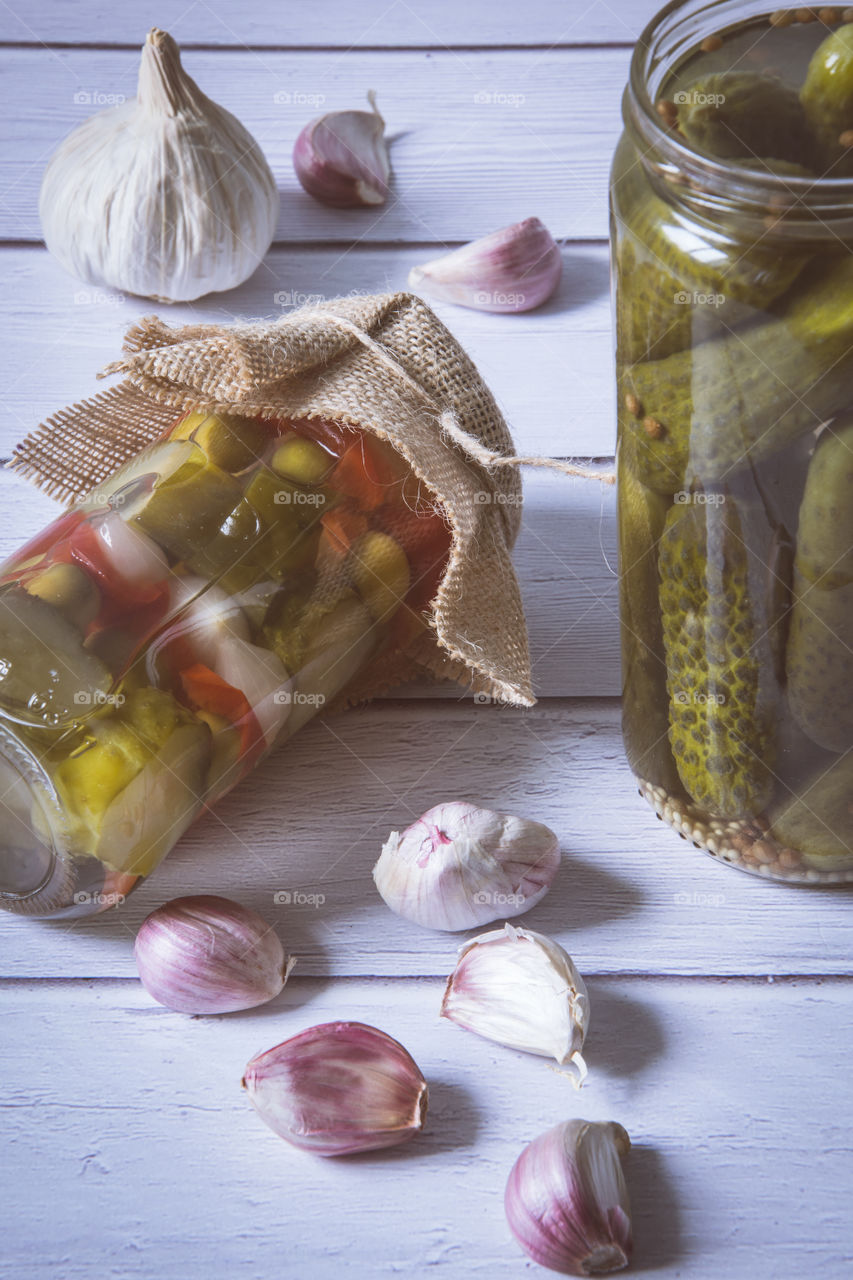 Pickled gherkin in mason jar