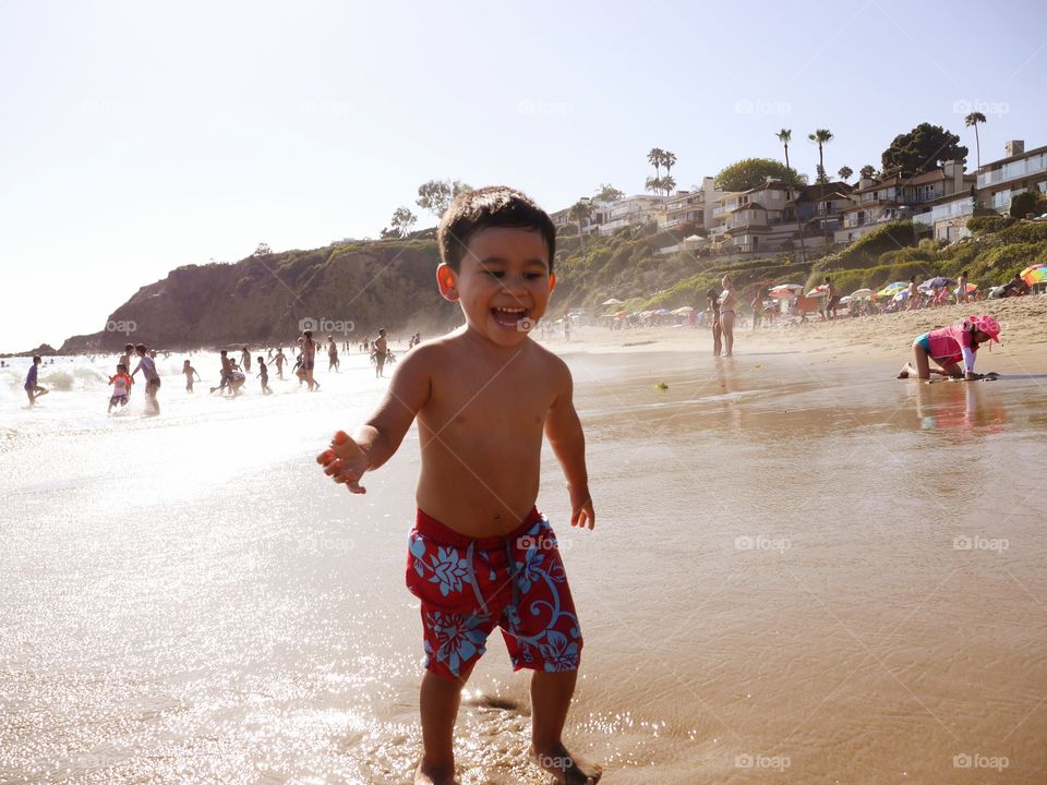 Boy. At the beach 
