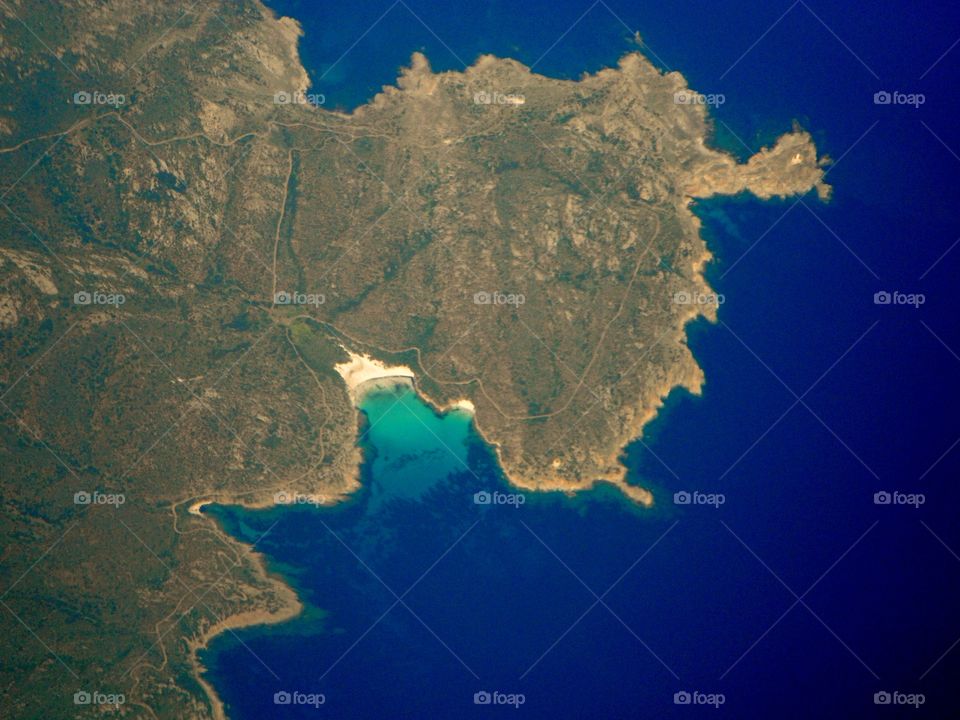 view of sandy beach And Cliffs og Asinara island, in north Sardinia, took from air flight