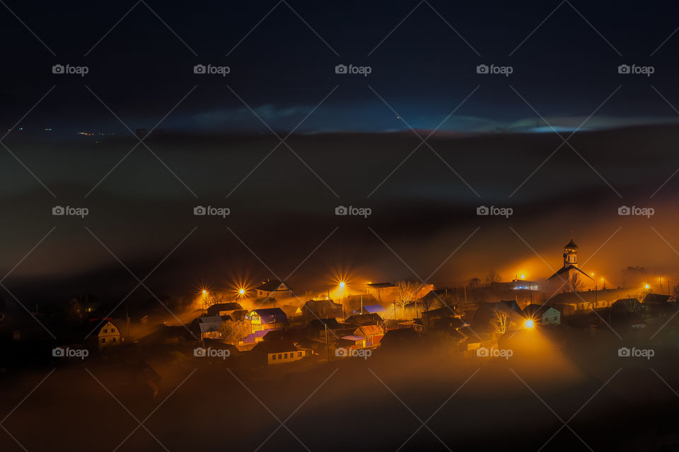 Night city in fog. kamchatka