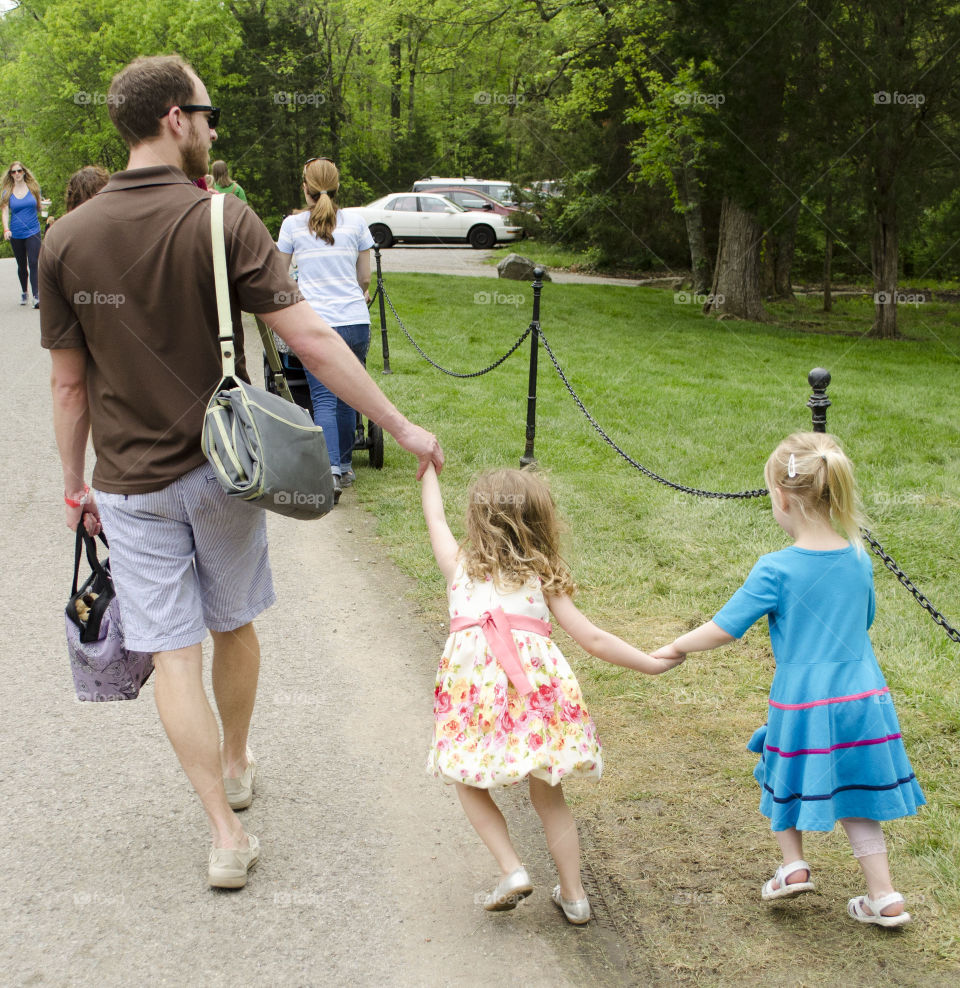 father abd daughters. family day 