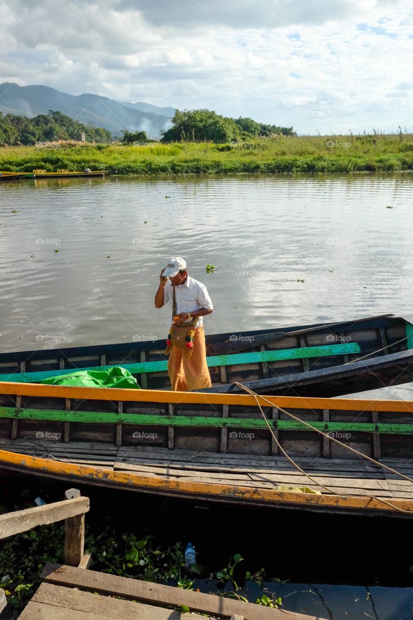 Boatman on the phone