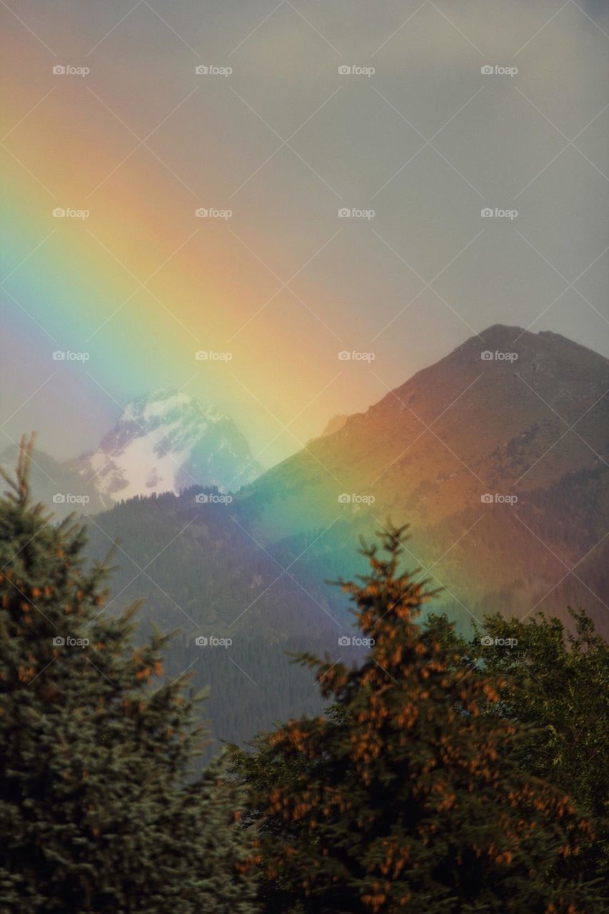 rainbow over mountains