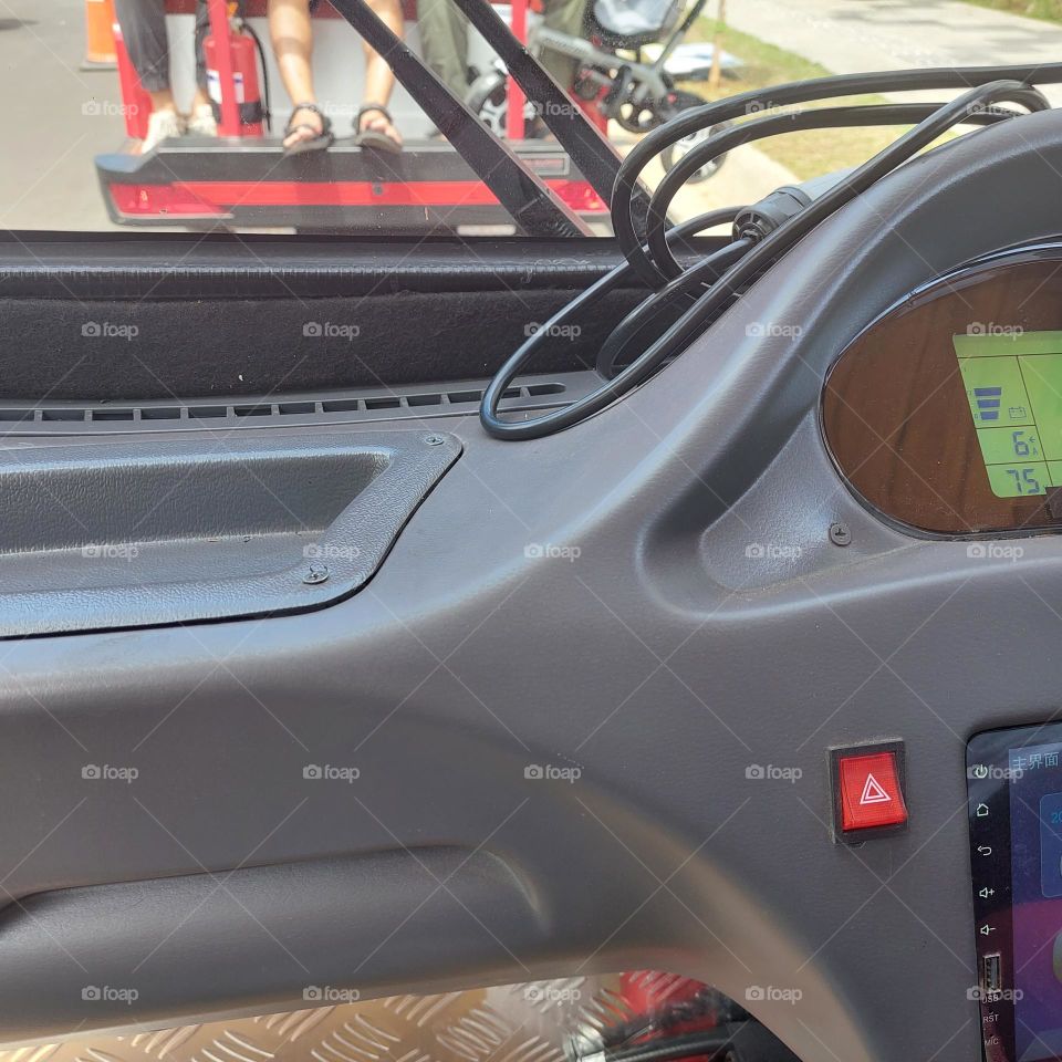 traveling by electric vehicle on empty streets with bicycle lanes on the side