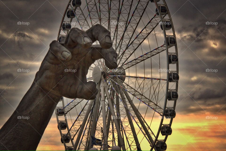 Ferris Wheel Fear. Ferris wheel seems to be under attack from a giant. 